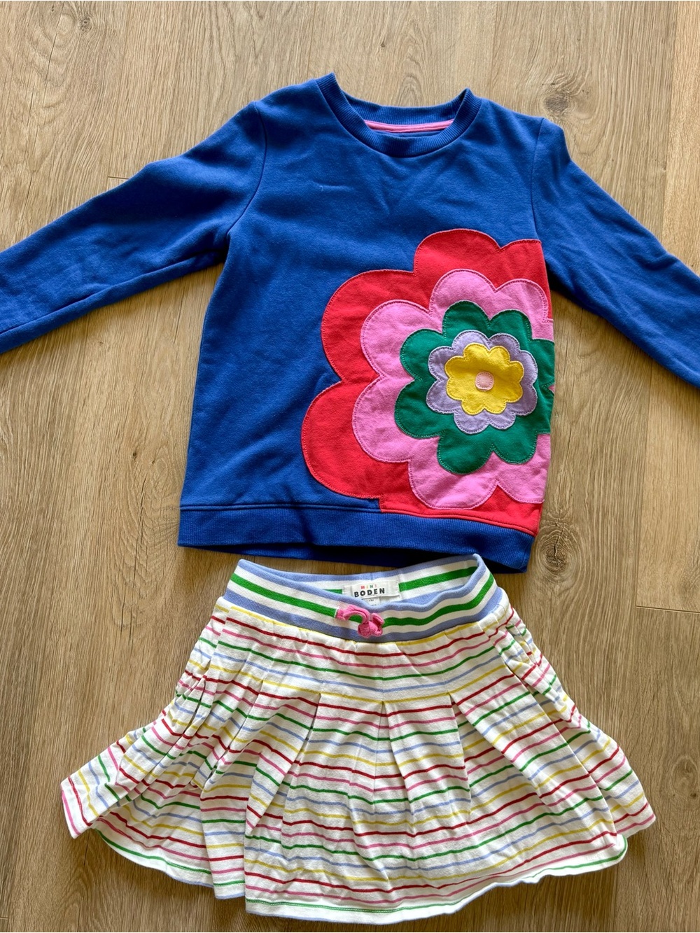 Boden Girls Blue Sweatshirt with Colorful Flower Appliqué & Striped Skort